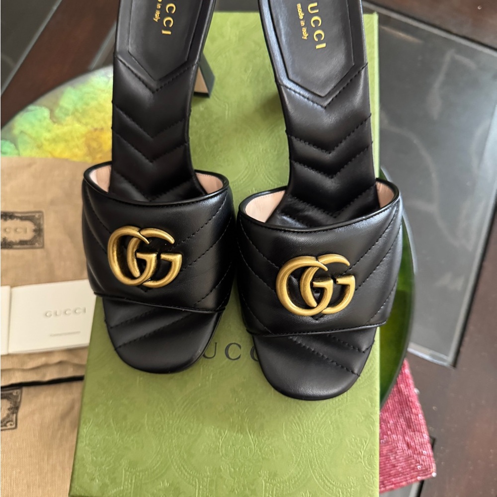 Gucci Black Leather Mules with Gold Logo